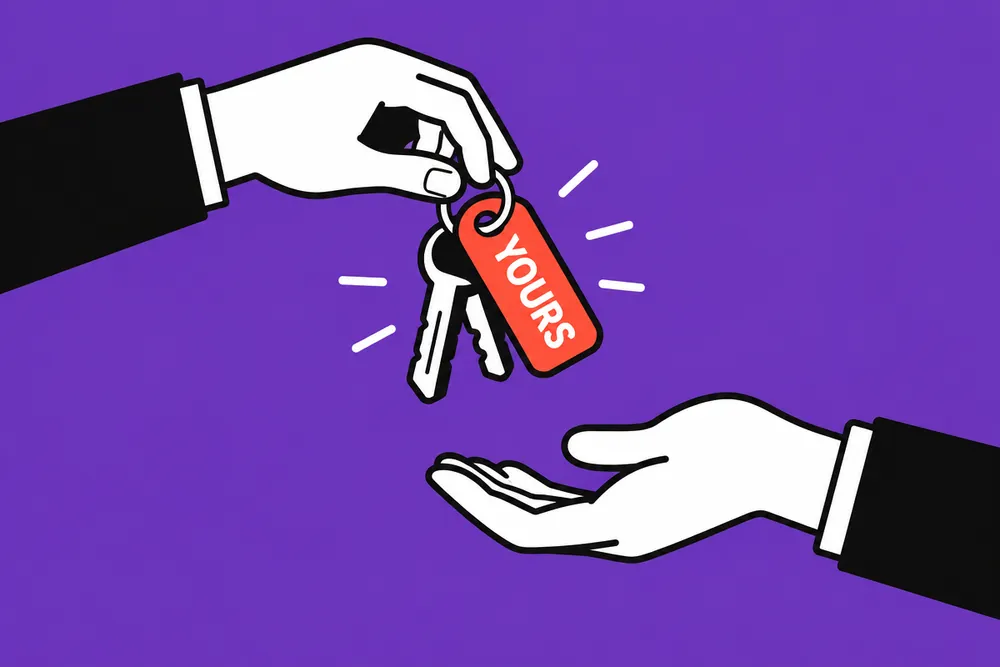 A hand passing keys with a tag that says Yours